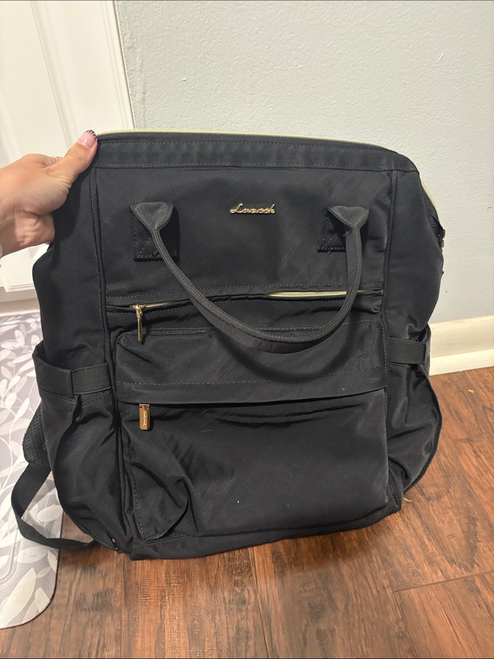 Black Nylon womens Backpack with Gold Accents